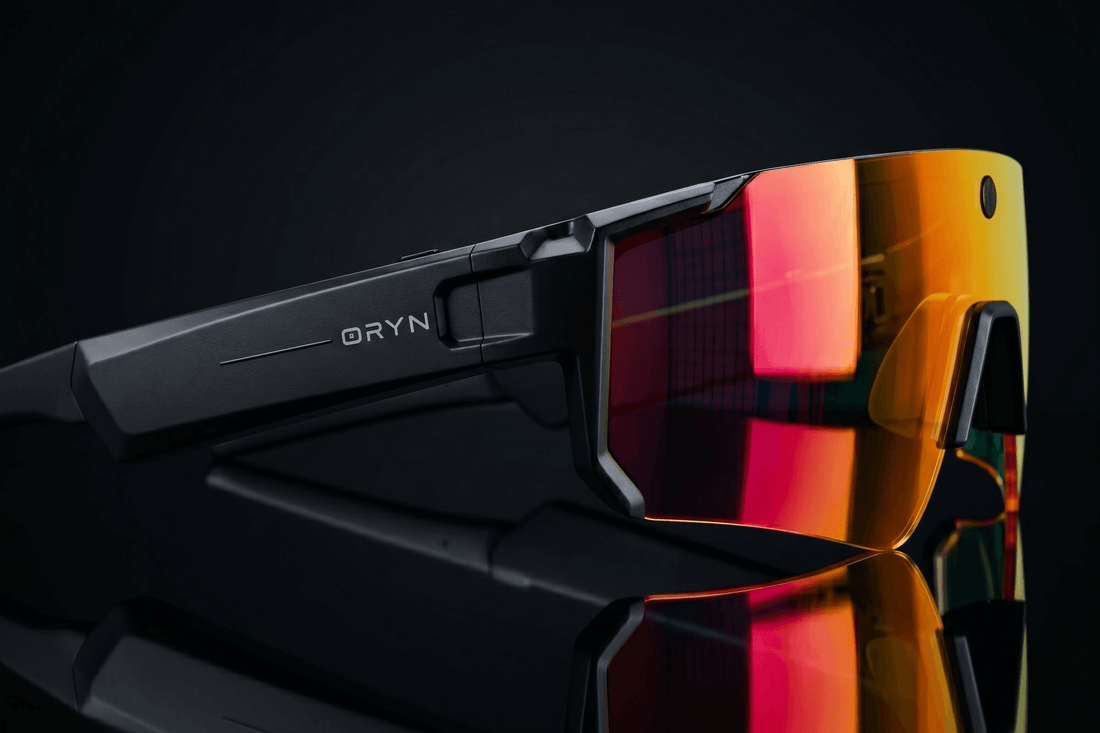 Affordable AI smart glasses 2026 featuring stylish design and vibrant orange lenses.
