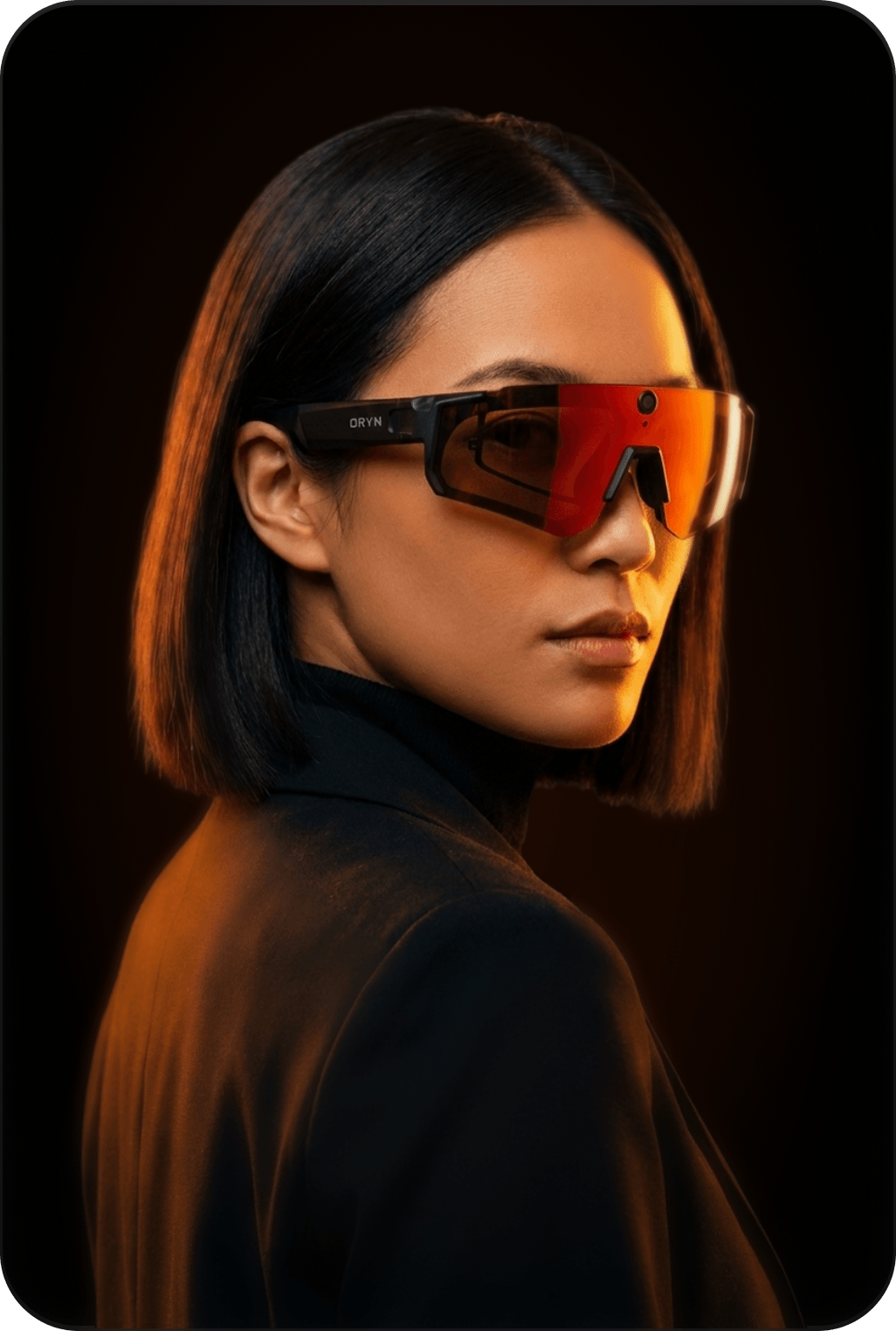 Person wearing futuristic sunglasses with a dark background