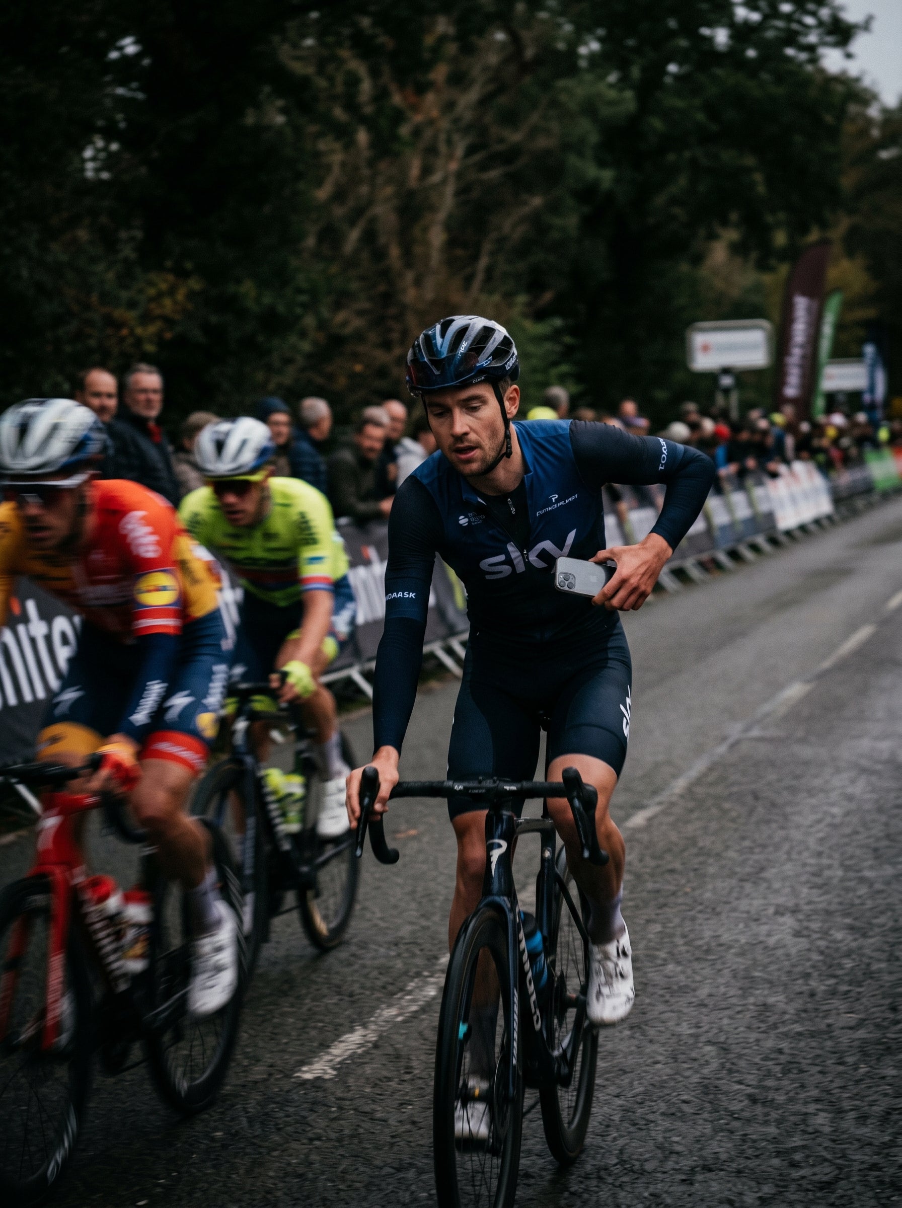 Cyclist in a race with other cyclists on a road