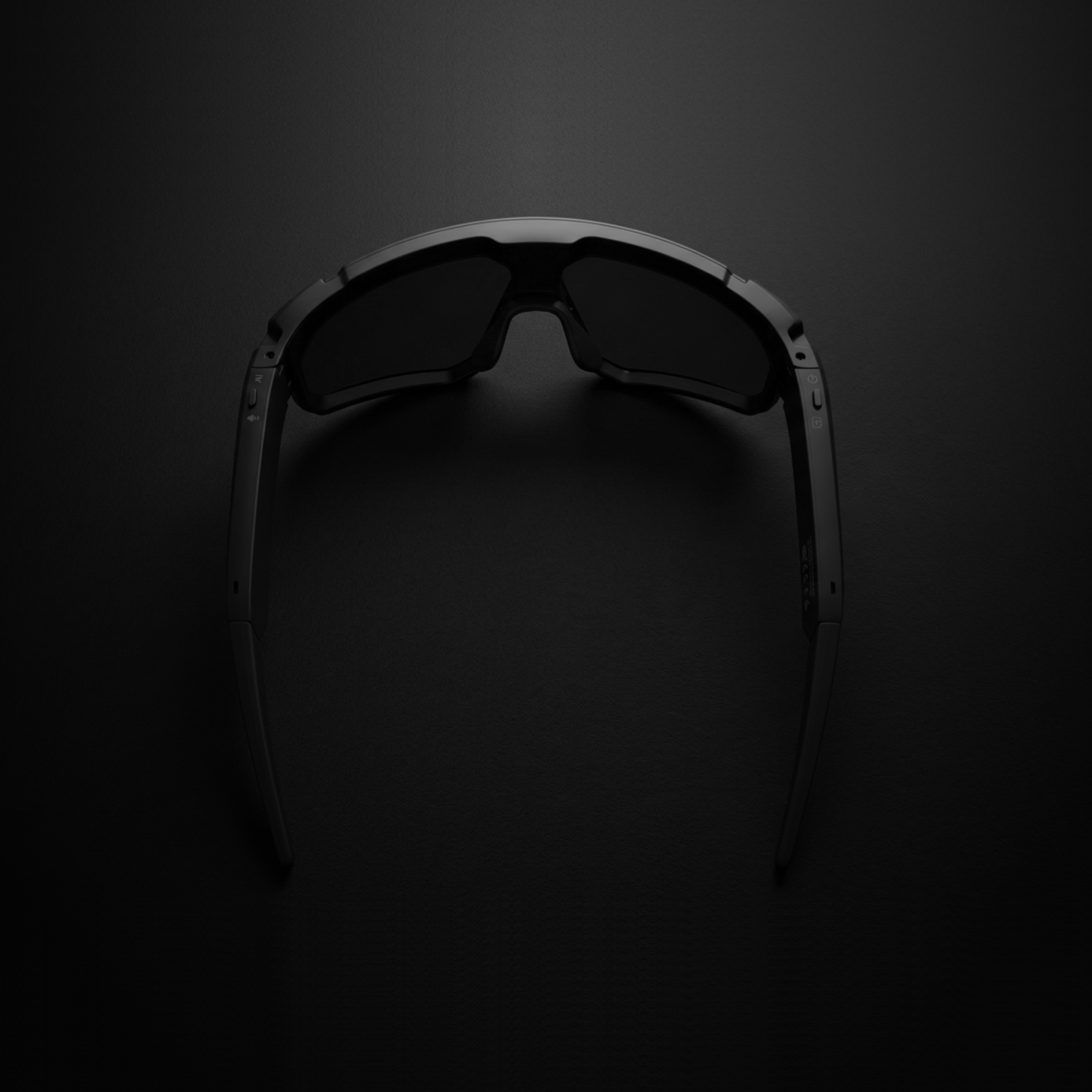AI sports glasses with camera showcased against a dark background, highlighting their sleek design and advanced technology.