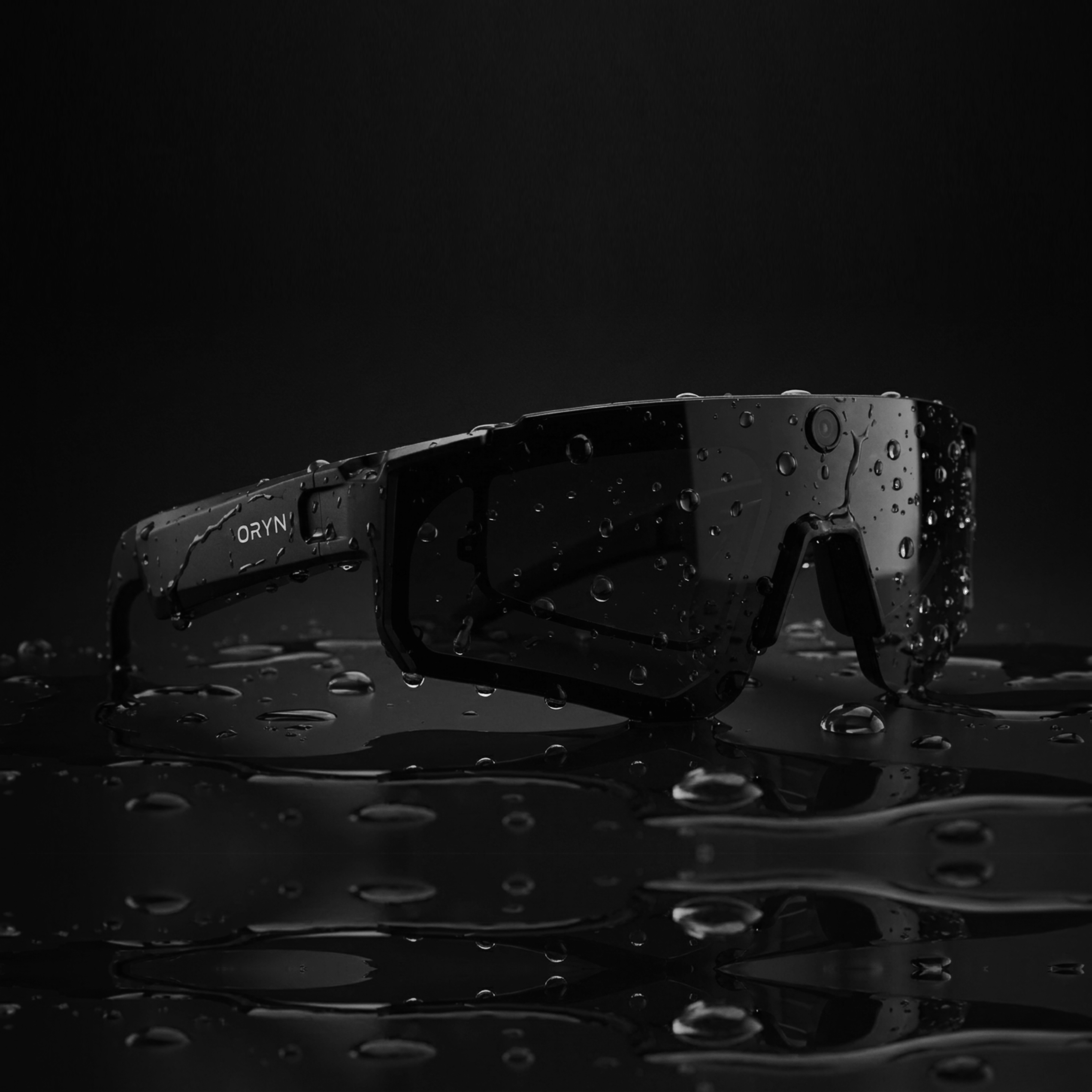 AI sports glasses with camera by ORYN, featuring a sleek design and water droplets for a dynamic look.